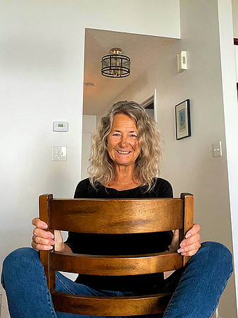 Lois straddles a chair - teasing me!