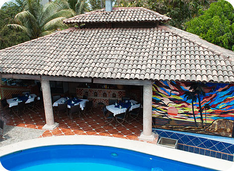 Poll overlooking outdoor kitchen