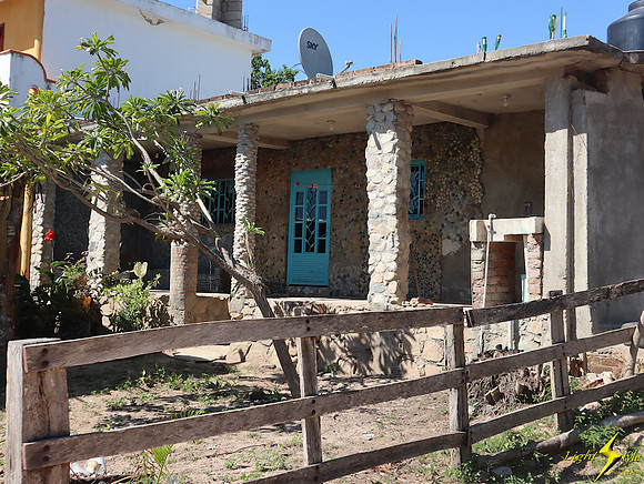 Rock house w blue door